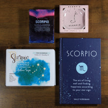 Load image into Gallery viewer, Contents of What&#39;s Your Sign Scorpio gift box: blue Scorpio horoscope book, box of Scorpio natural crystals, pink scorpio ring dish, and purple and blue Scorpio soap