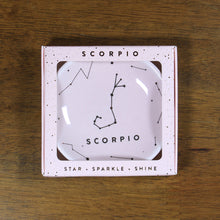 Load image into Gallery viewer, Scorpio Zodiac Ring Dish from Lucky Feather. Blush pink ring dish with gold print. Ring dish says Scorpio and has an illustration of the Scorpio constellation.