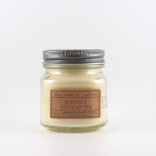 Load image into Gallery viewer, Mason Jar candle: an 8 oz mason jar with a metal cap, filled with off white wax, with a kraft paper label on the front that reads "Happily Ever After"