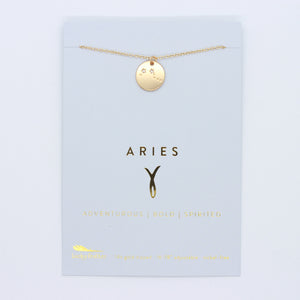 aries necklace: gold pendant necklace with engraved aries constellation on blue card packaging