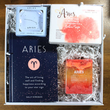 Load image into Gallery viewer, overhead view of what's your sign aries zodiac gift box with crystals, soap, book and ring dish in white box with white crinkle paper