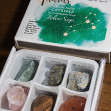 Load image into Gallery viewer, The inside of the Taurus natural crystals from Rock Paradise, which includes six crystals in a plastic tray.