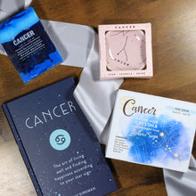 Load image into Gallery viewer, Cancer themed gift items from the &quot;What&#39;s Your Sign?&quot; Cancer zodiac gift box. Gifts include Cancer astrology soap, cancer trinket dish, Cancer crystals, and a Cancer horoscope book