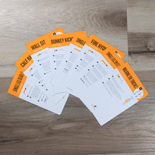 Load image into Gallery viewer, This photo shows eight bodyweight fitness cards spread out in a fan across a wood floor. Each card has a yellow band across the top with the name of an exercise, and the rest of the card is white with written exercise instructions.