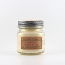 Load image into Gallery viewer, Mason Jar candle: an 8 oz mason jar with a metal cap, filled with off white wax, with a kraft paper label on the front that reads &quot;Happily Ever After&quot;