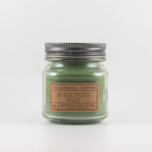 Mason Jar candle: an 8 oz mason jar with a metal cap, filled with green wax, with a kraft paper label on the front that reads "Eucalyptus Sage"