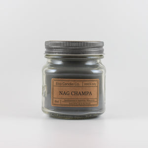 Mason Jar candle: an 8 oz mason jar with a metal cap, filled with grey wax, with a kraft paper label on the front that reads "Nag Champa"