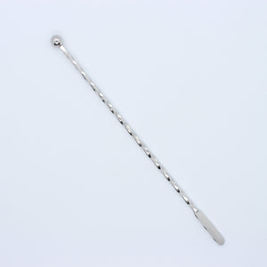 silver swizzle stick with twisted design, on a white background