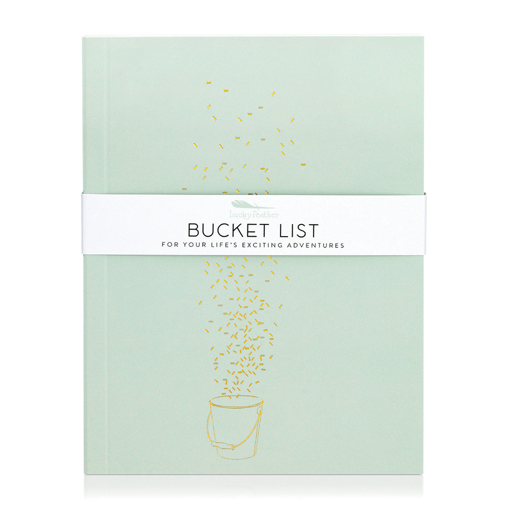 A mint green journal with a gold embossed bucket illustration. A band around the journal says 